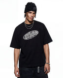 chest embroidery detail on oversized streetwear T-shirt