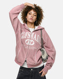 model wearing pink puff print zip hoodie