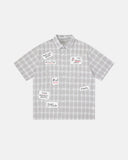 plaid short sleeve shirt with metal stud detail