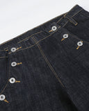 dark raw denim jeans with asymmetrical button design