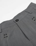 grey pleated tailored shorts with front stud detail