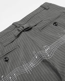 grey tailored pants pleat and embroidery detail