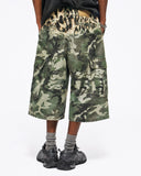 Below-knee camo cargo shorts with contrast leopard print detail