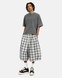 detail of plaid pattern and waistband