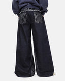 on-body back view of zebra pattern baggy jeans