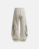 Back view beige thorn print loose casual sweatpants