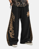 full-body streetwear outfit with black graphic sweatpants
