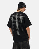 model wearing black skeleton x-ray mesh t-shirt side view