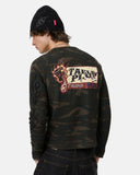 model wearing camo long sleeve t-shirt casual pose
