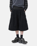 model wearing black wide leg cropped cargo pants front view