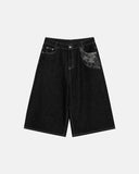 baggy denim jorts with embroidered pocket detail and loose fit
