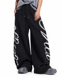 barrel sweatpants with script graphics