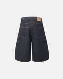 Curved seam washed denim long jort