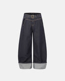 flat lay of wide leg raw denim jeans front