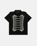 braided cord embroidery detail on black polo t shirt