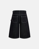 clean minimal jorts in dark raw denim with contrast stitching