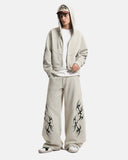 model wearing cropped zip up hoodie with hood