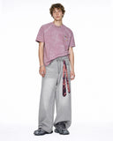 model wearing relaxed graphic t shirt with denim styling