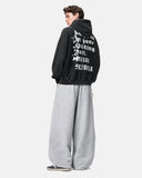 side back view showing distressed text graphic hoodie
