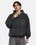 model wearing washed black graphic hoodie