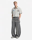 music staff graphic print on pinstripe pants