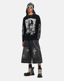 full body outfit with graphic waffle t shirt and wide shorts
