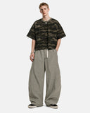 Side angle of Cordura nylon utility pants with drawstring waist detail