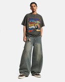 model full body outfit wearing oversized graphic t shirt with barrel jeans