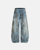 dirty wash distressed barrel jeans front view