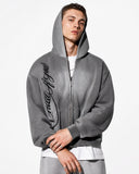 model front view wearing monkey wash graphic boxy zip up hoodie