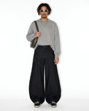 Male model full body shot black baggy  pants outfit