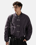 model wearing washed metal clasp bomber jacket upper-body view