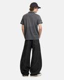 model back view wearing faded gray short sleeve polo