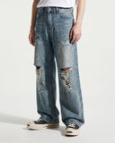 distressed denim detail with faded vintage wash