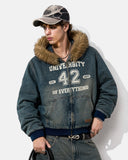 model wearing washed denim hooded jacket upper-body front view