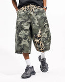 Longline cargo shorts with leopard and camo mixed print design
