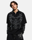 model upper body wearing black gothic graphic polo shirt