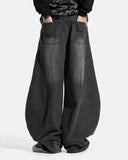 on-body front view of black curved seam barrel jeans