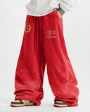 on-body red graphic barrel sweatpants styling