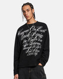 model styling black script graphic long sleeve t shirt