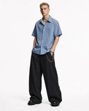 barrel-leg tailored pants structured drape silhouette