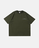 Urban streetwear look featuring a charcoal washed reflective tee with cargo pants.