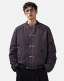 model wearing metal clasp bomber jacket upper-body front view