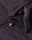 metal clasp closure detail on washed bomber jacket close-up