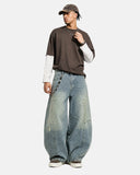 barrel jeans styled with oversized Tshirt
