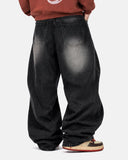 on-body back view of washed black baggy jeans