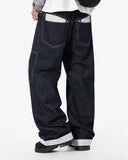model wearing polka dot baggy jeans back view