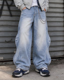 INFLATION Wave Washed Baggy Jeans