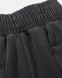 elastic waistband and back pocket detail on barrel sweatpants