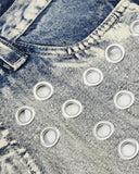 eyelet hardware detail on blue denim denim